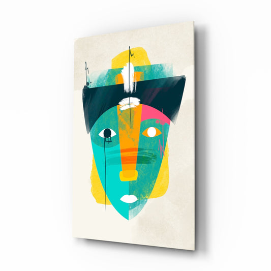 Abstract geometric face artwork on cream canvas featuring turquoise, yellow, orange, and dark teal colored sections with stylized facial features.