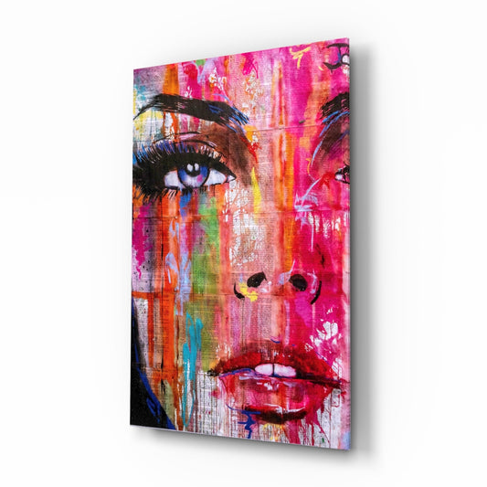 Angled view of colorful graffiti-style glass wall art featuring a vibrant portrait with pink, orange, and blue paint effects and black line details.