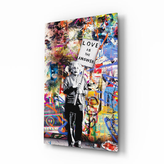 Glass art panel featuring Einstein holding a sign reading "LOVE IS THE ANSWER" against vibrant multicolored graffiti-style background.