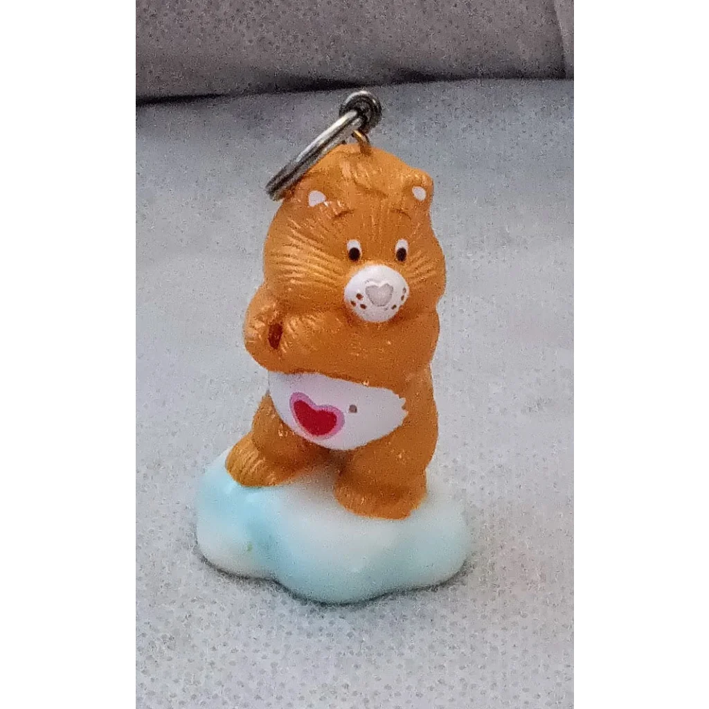 Vintage 1985 Care Bears Tenderheart Bear keychain with orange heart belly