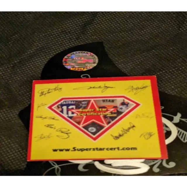 Yellow signed pick guard certificate with red border and diamond graphic for Carrie Underwood signed pick