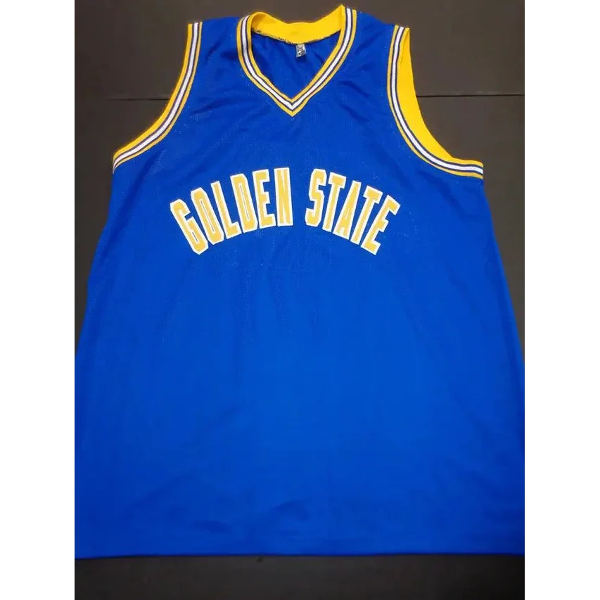 Blue basketball jersey with yellow and white trim from Clifford Ray Golden State Warriors