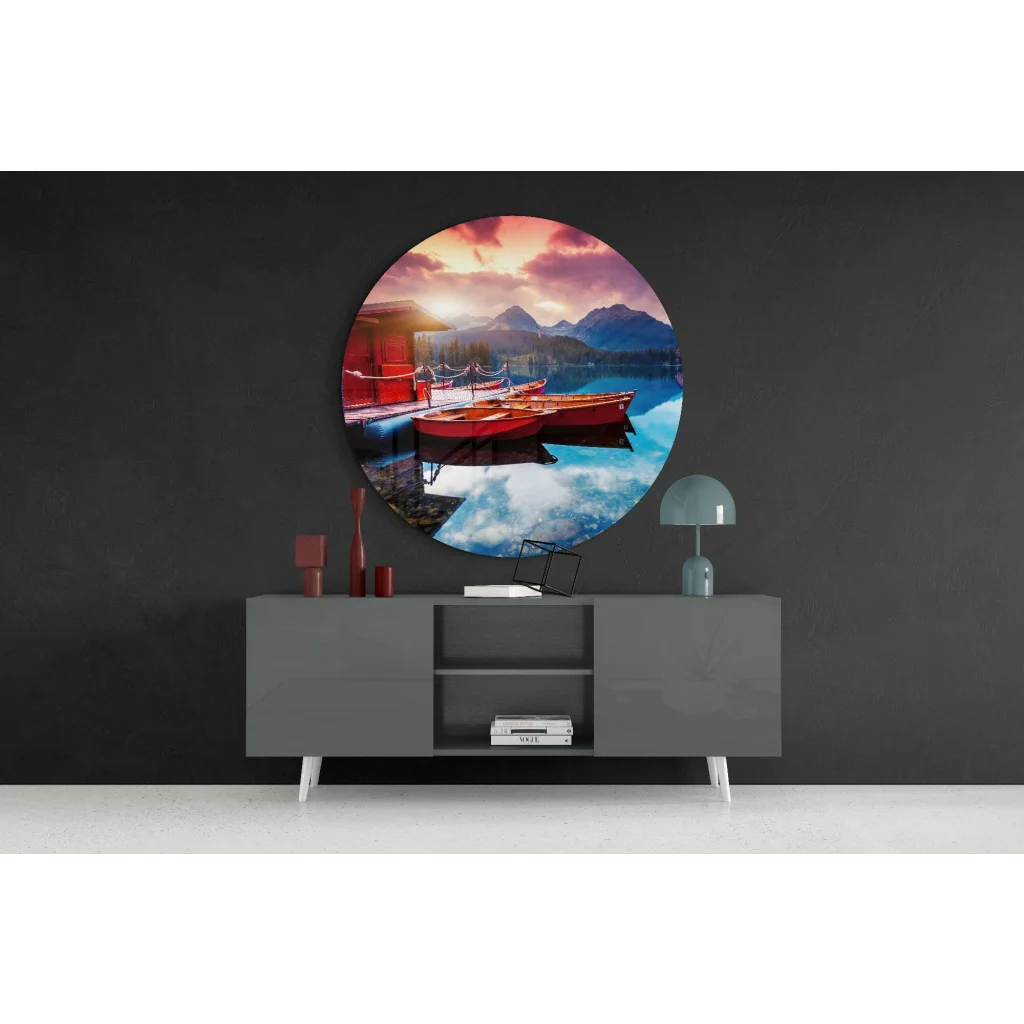 Vibrant sunset tempered glass art with red boats and mountains on calm lake