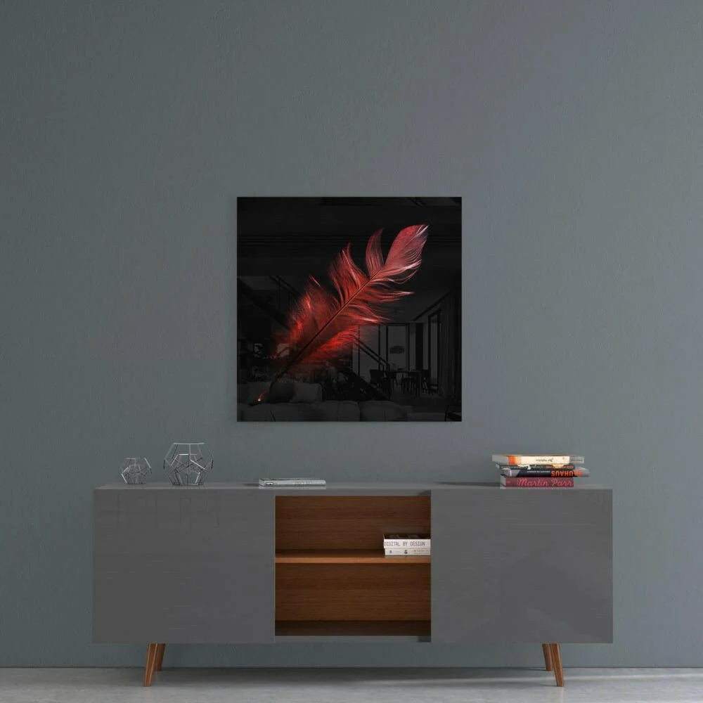Stunning red feather glass wall art on black panel above console table
