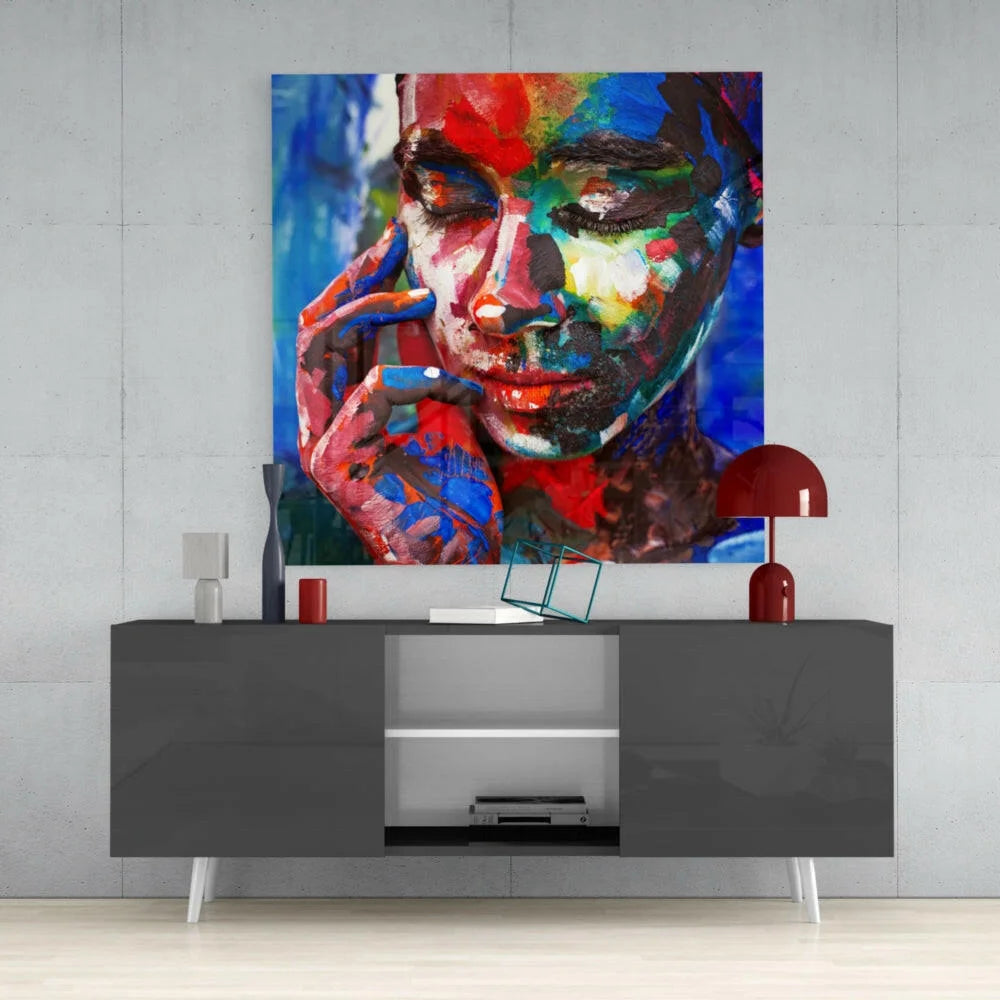 Vibrant abstract glass wall art portrait with bold red blue green strokes
