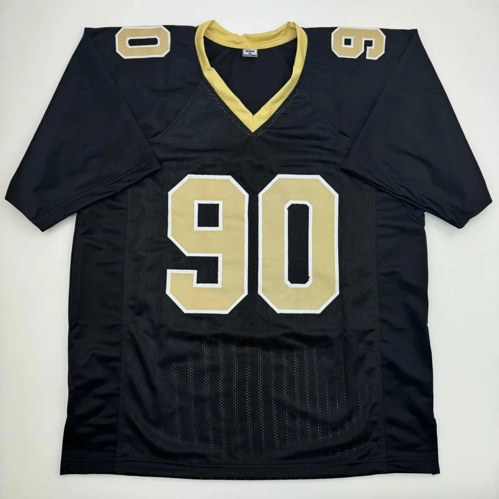 Black and gold custom jersey with number 90 from professional sports league collectible