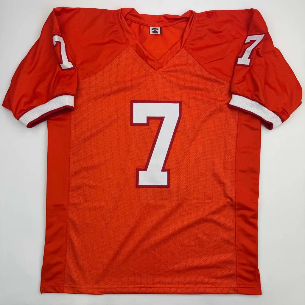 Orange custom jersey with number 7 and white trim for professional sports fans
