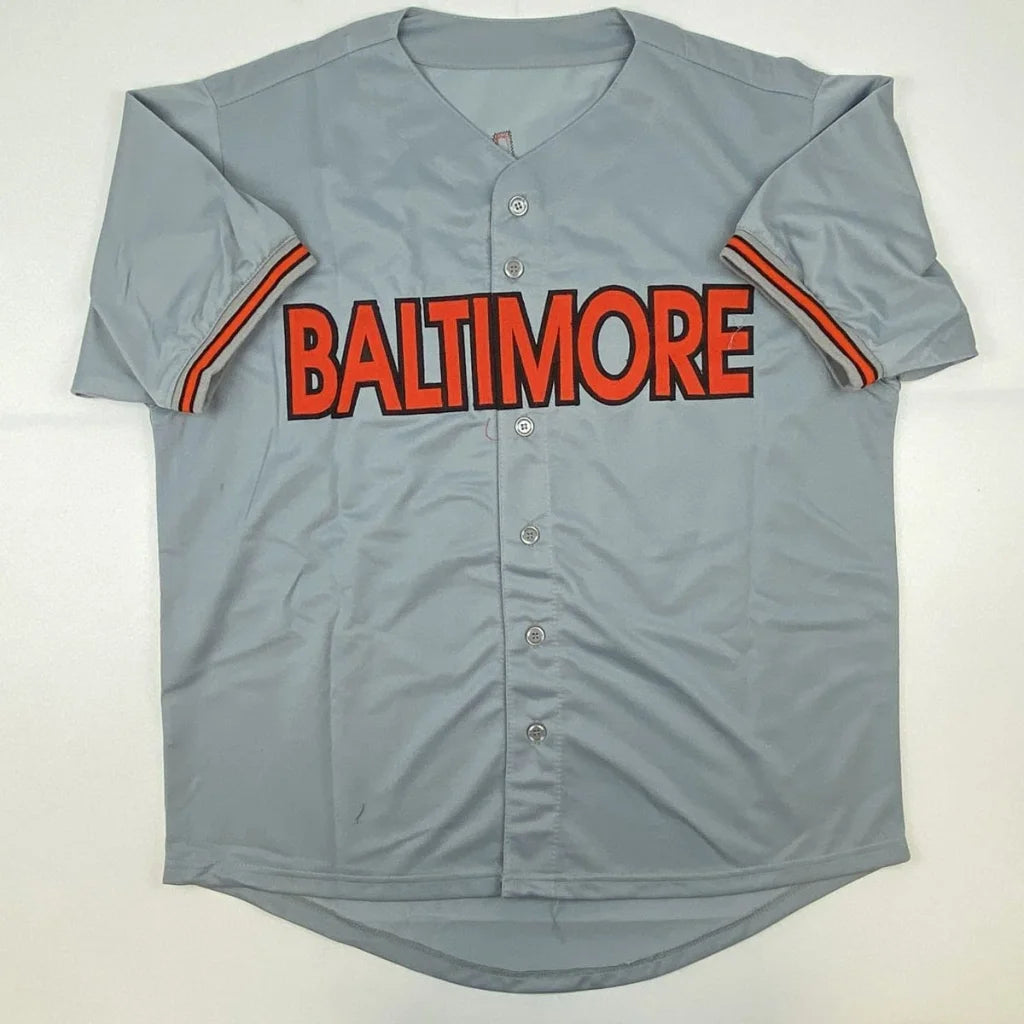 Gray custom baseball jersey with orange and red accents, Palmer Number 22 for sports league