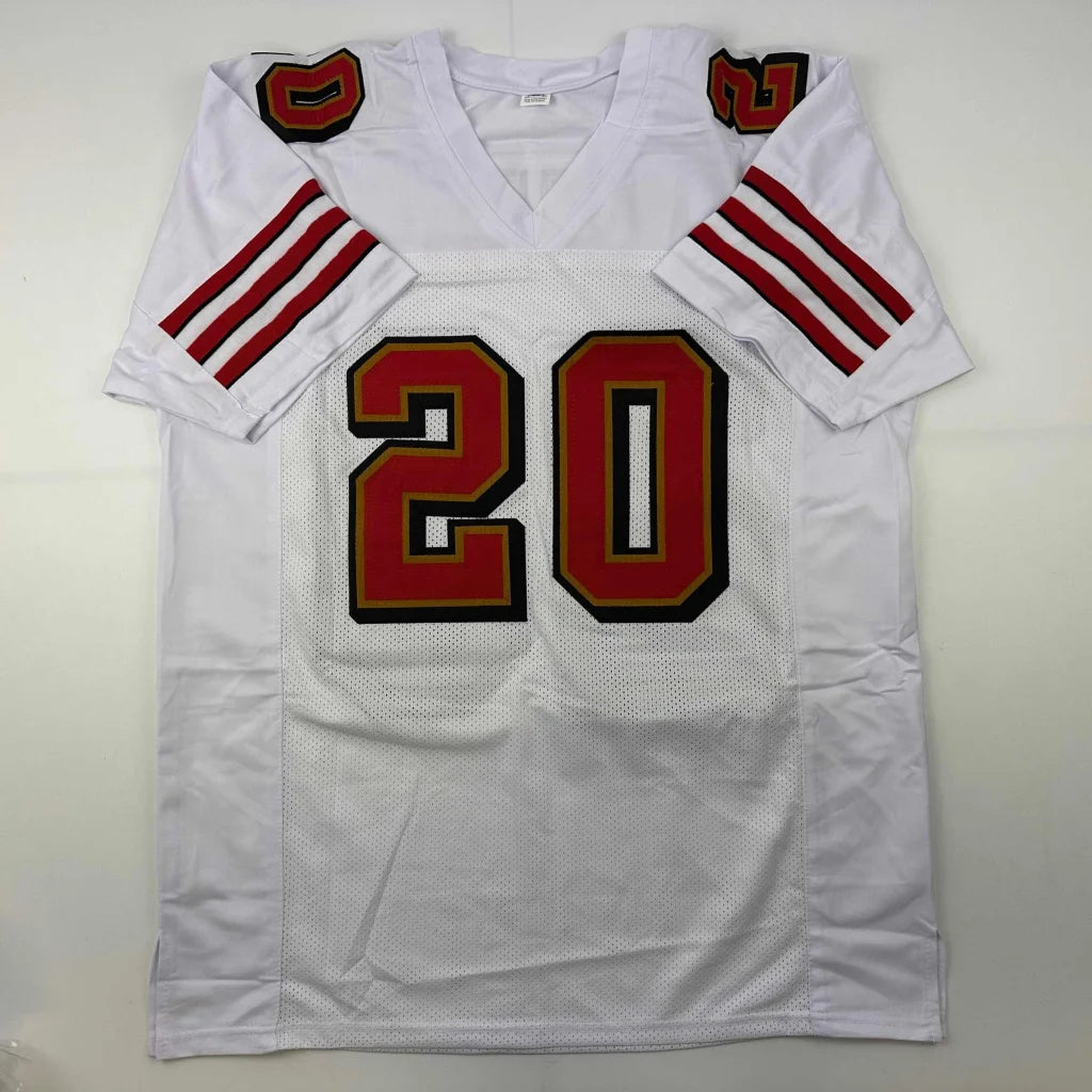 White custom jersey with red and gold accents from the Hearst 20 Autographed Football Collectible for sports fans