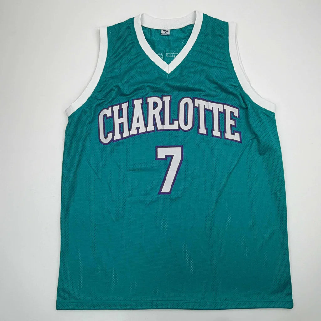 Teal Charlotte Hornets custom jersey #7 silver, signed by Knueppel