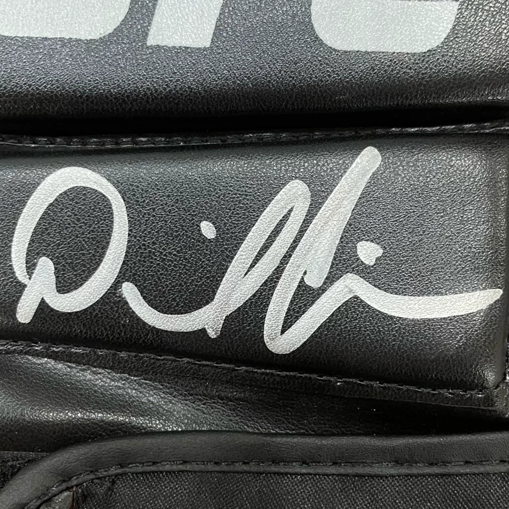 Daniel Cormier hand signed UFC glove with GSP signature
