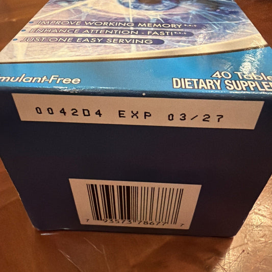 Blue and tan dietary supplement box with barcode and expiration date 03/27 visible on side.