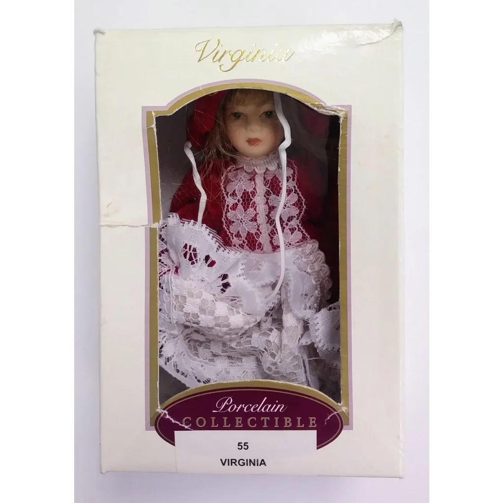 Virginia Porcelain holiday ornament doll in red white lace dress with festive charm