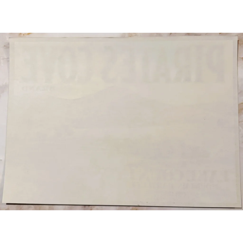 Blank white paper showcased in the Vibrant Pirates Cove Crate Label from 1950s California