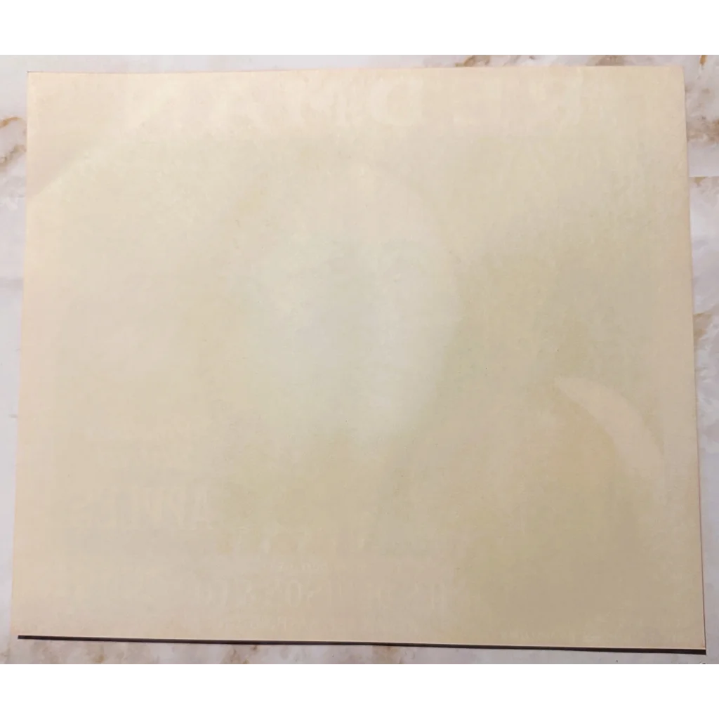 Cream-colored rectangular paper from vintage 1930s Redman Apples crate label