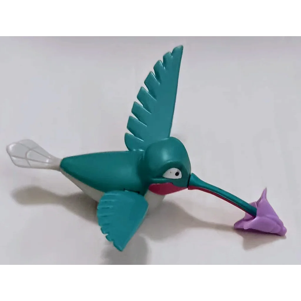 Burger King Kids Club Flit Hummingbird toy in green and purple plastic