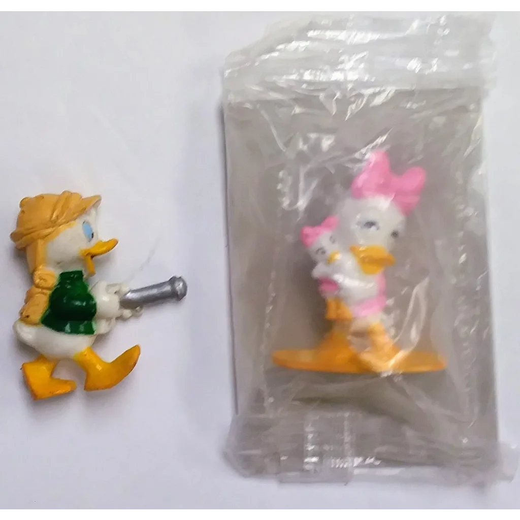 Vintage 1994 Disney DuckTales PVC figure set with Donald Duck in green shirt