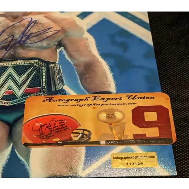 Collectible memorabilia display with autographed 8x10 photo and sports-themed items