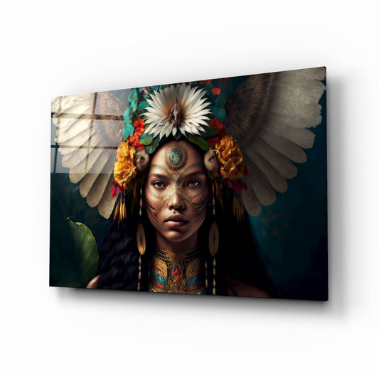 Glass wall art featuring a woman with facial tattoos, white feathered wings, and a colorful floral crown against a dark background.