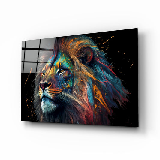 Angled perspective of glass wall art displaying a colorful lion's head with rainbow mane in blues, oranges, and yellows against black background.