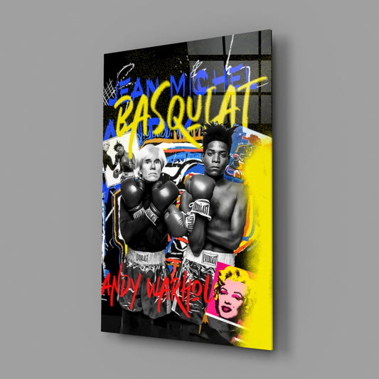 Angled right side view of glass wall art featuring two boxers in black and white with bold yellow and blue graffiti text and Warhol-style portrait on vibrant yellow background.