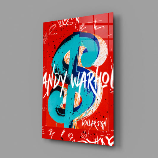 Angled perspective of turquoise dollar sign with navy and orange accents on bright red glass panel against gray background.