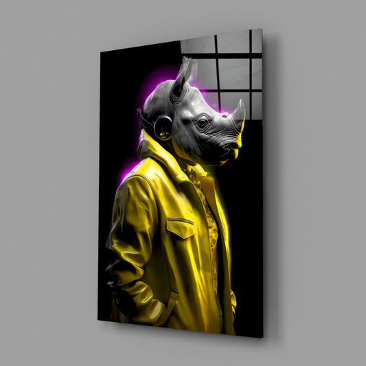 Angled view of glass wall art displaying a rhino in yellow jacket with purple neon glow effect against black background.