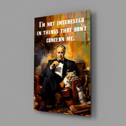 Angled view of glass wall art featuring suited man with cat, warm orange tones, and white text quote displayed against gray background.