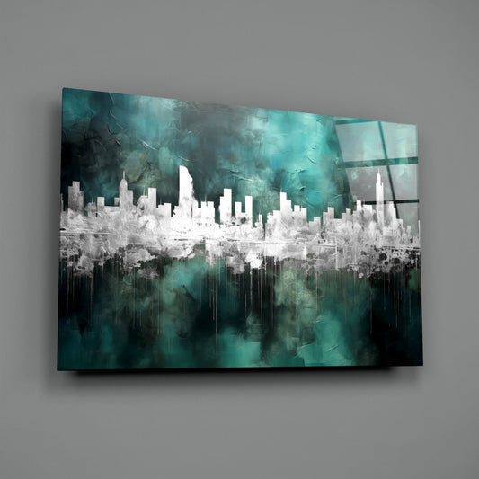 Teal and white cityscape glass art mounted on gray wall, showing skyline silhouette with dripping effect and layered background.