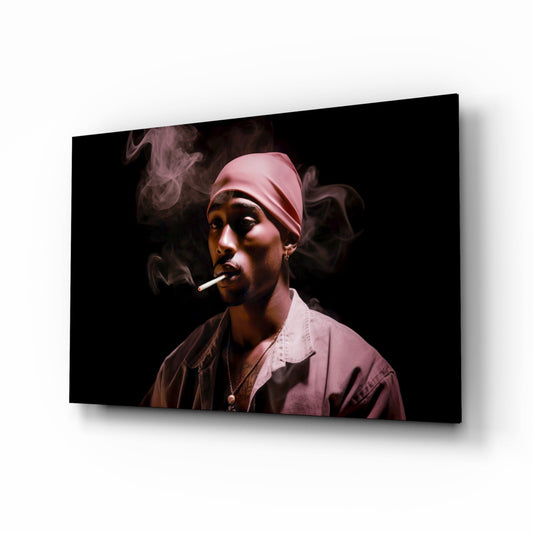 Angled view of glass wall art depicting a person wearing a pink bandana and shirt, smoking a cigarette against a dark background.