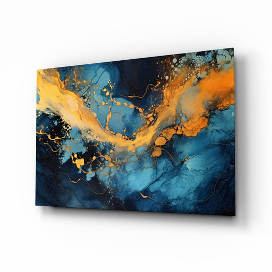 Angled perspective of turquoise and amber abstract glass wall art with fluid ink patterns and gold accents.