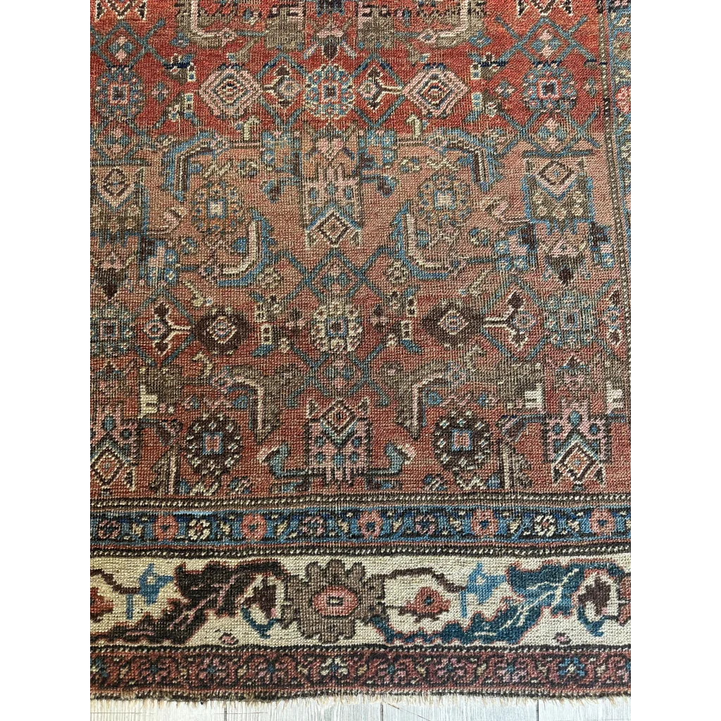 Vintage century persian rug in natural wool, perfect condition, red field with geometric patterns
