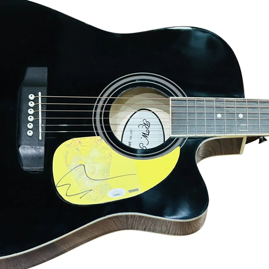 Ed Sheeran black acoustic guitar with autograph and yellow pickguard