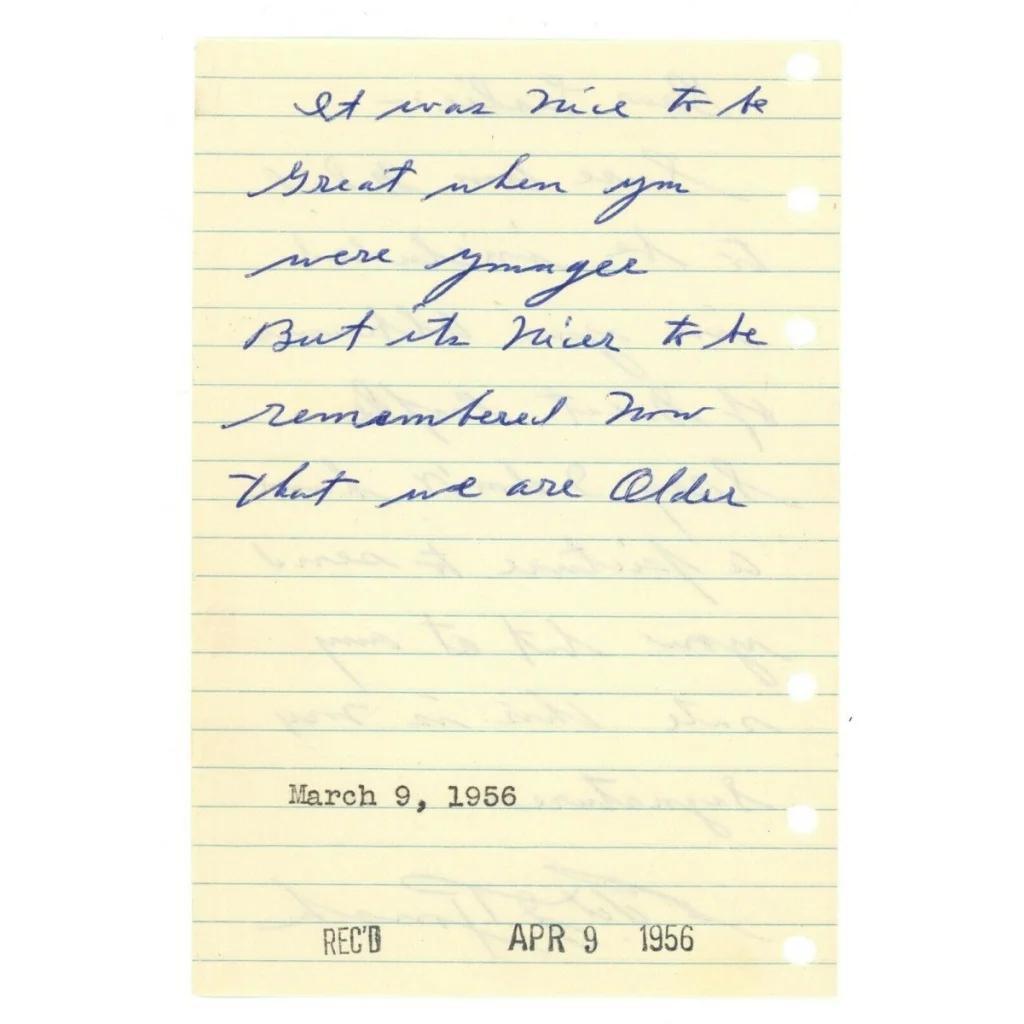 1956 handwritten note on yellow legal pad with blue ink signature