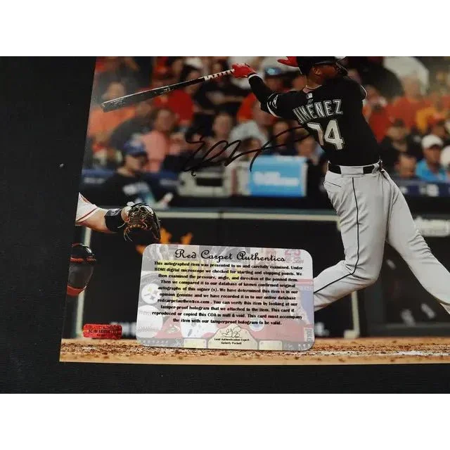 Autographed Eloy Jimenez signed 8x10 photo with authenticity sticker collectible