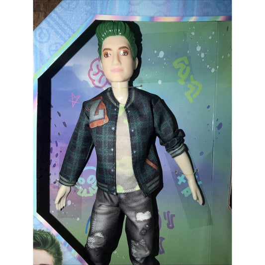 Zombies 3 Zed doll with green spiked hair wearing dark textured jacket and ripped black pants in packaging.