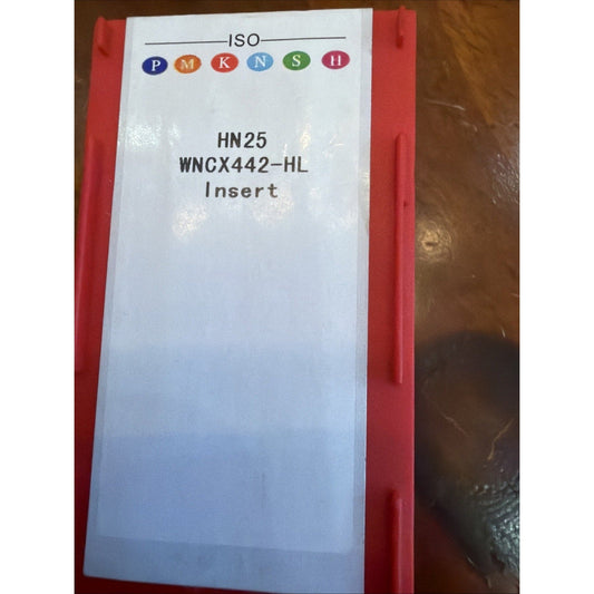 Red foam-lined packaging box containing white label printed with "HN25 WNCX442-HL Insert" and ISO PMKNSH logo.