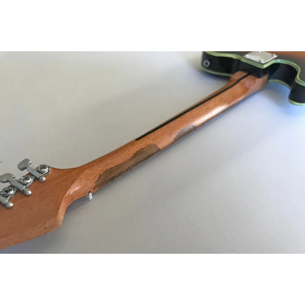 Fender Telecaster Mini Guitar with unique wood grain, adjustable a-frame stand