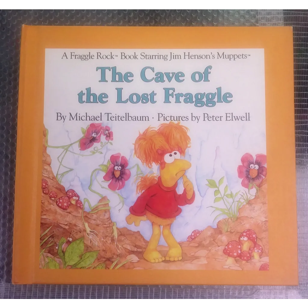 Orange Fraggle Rock hardcover with Lost Fraggle cover art