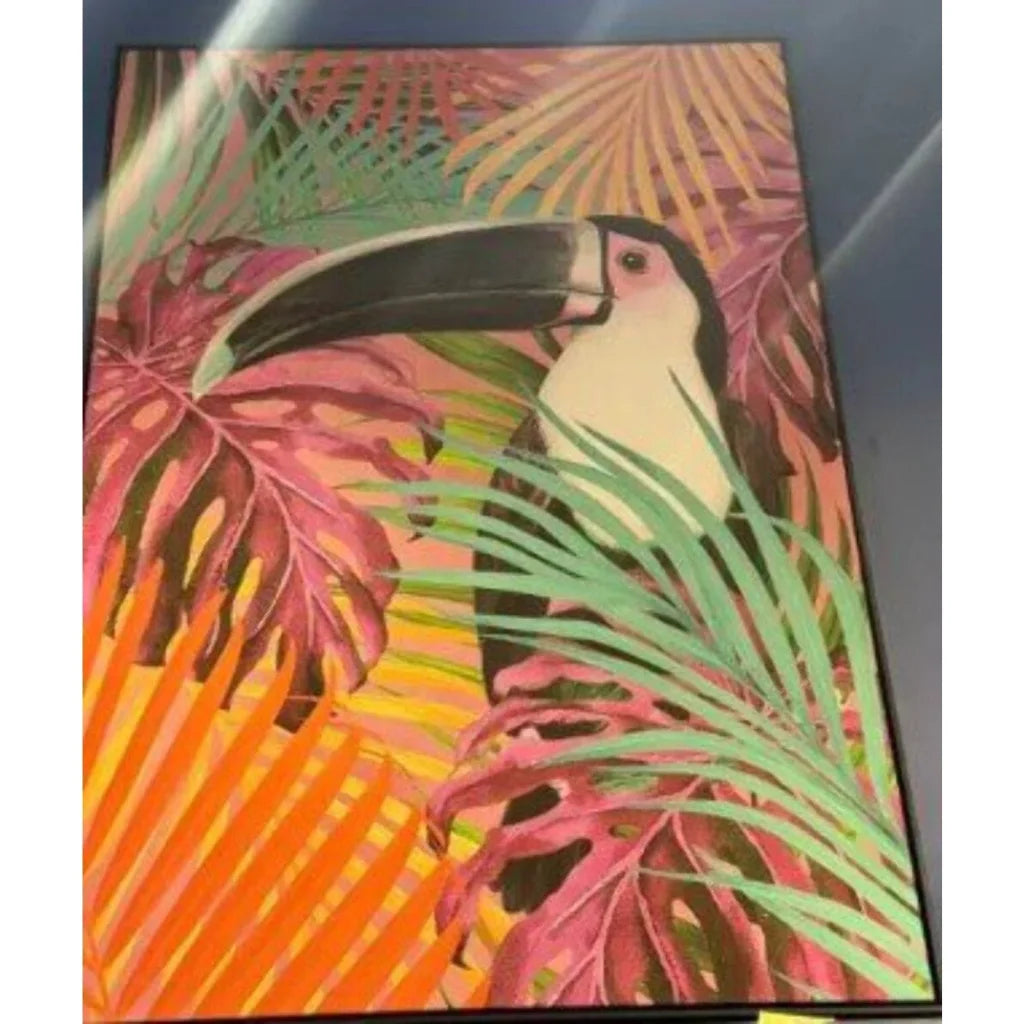 Vibrant toucan framed print with black-white plumage in lush pink-green-orange foliage, 48x36