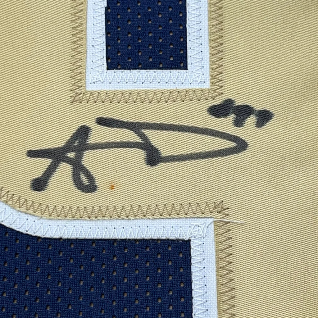 Aaron Donald signature close up on dark blue Los Angeles Rams football jersey in 35x39 framed display