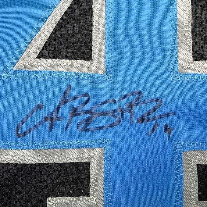 Framed Autographed Amon-Ra St. Brown 35x39 Detroit Black Football Jersey Beckett BAS COA | Certified Authentic Signed Memorabilia | vintageantiquesgifts.com