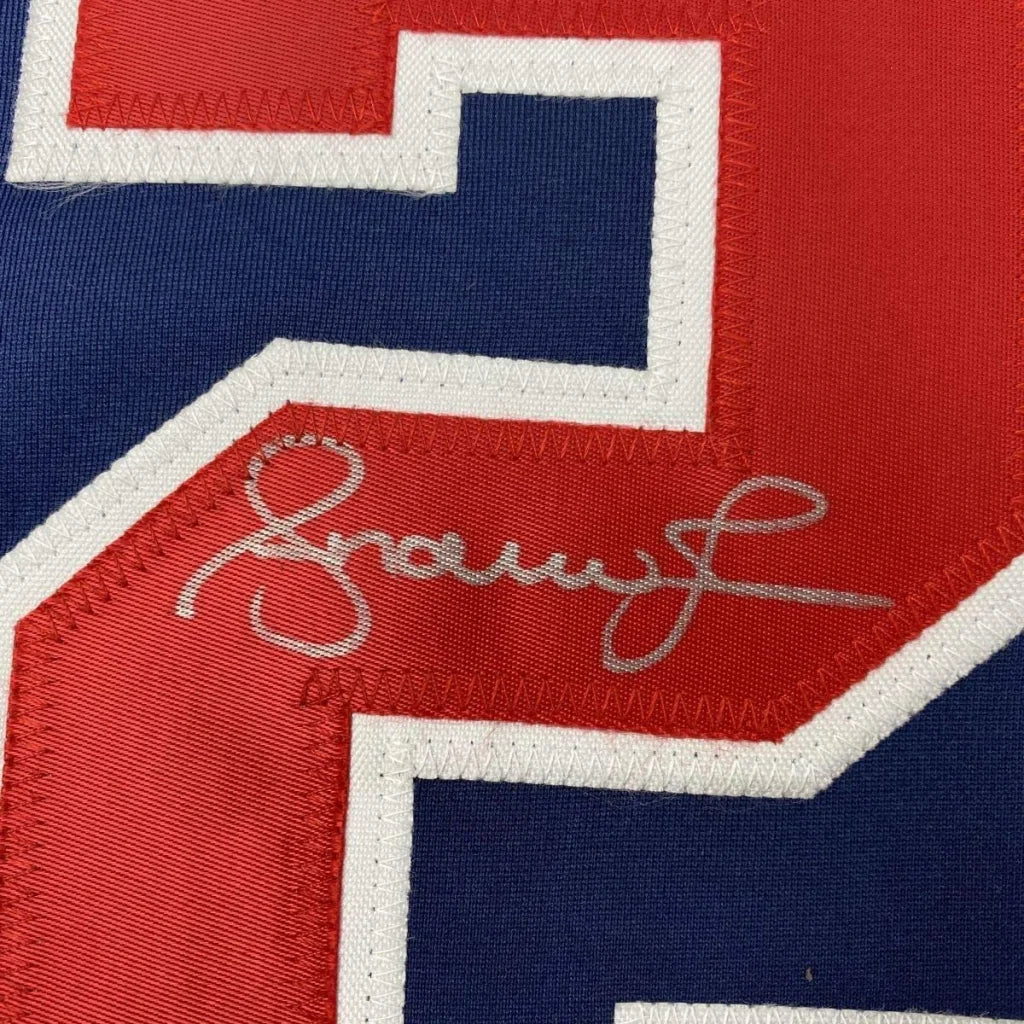 Framed autographed Andruw Jones Atlanta blue baseball jersey with silver signature