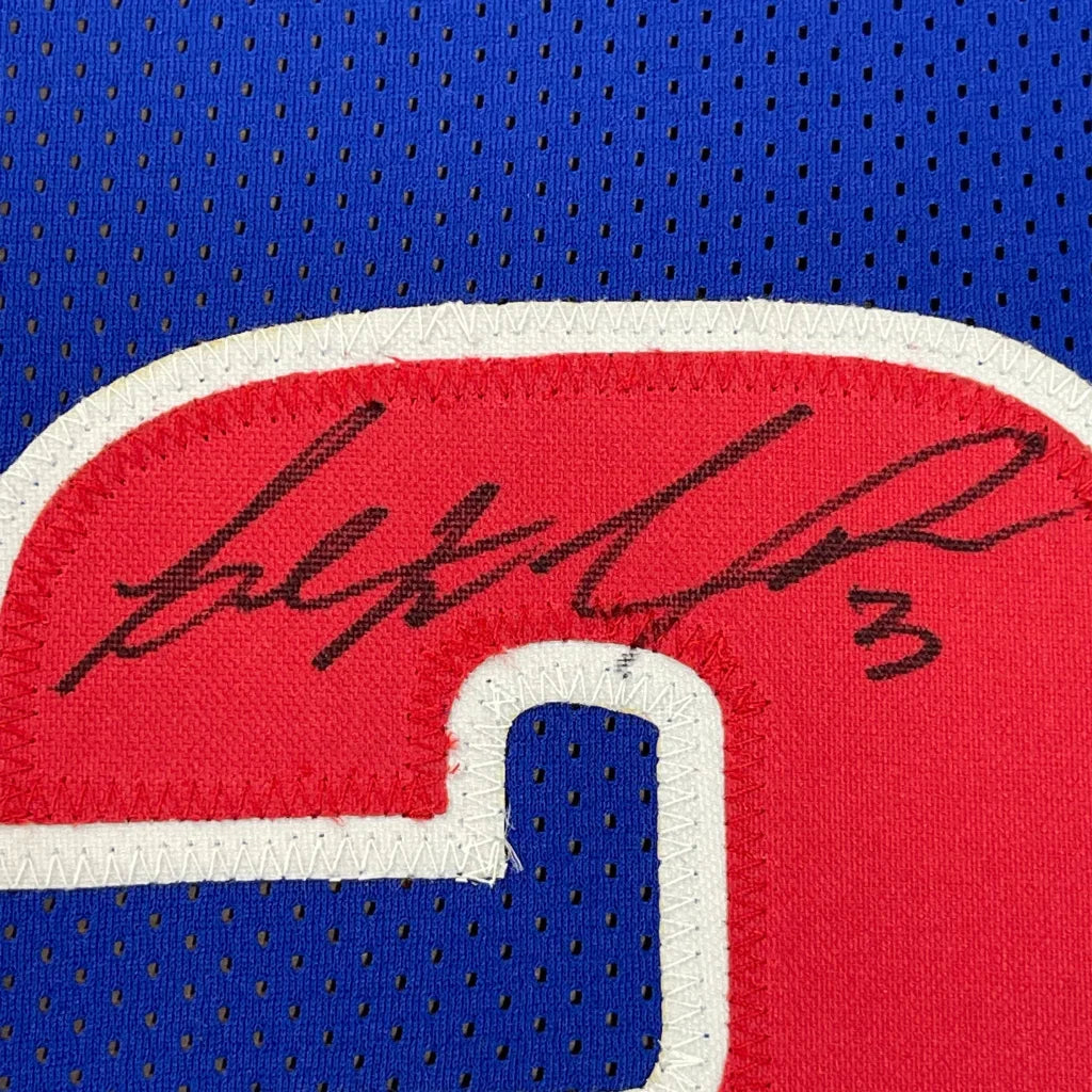 Autographed Red and White Ben Wallace Jersey with Action Photos on Blue Mesh Background