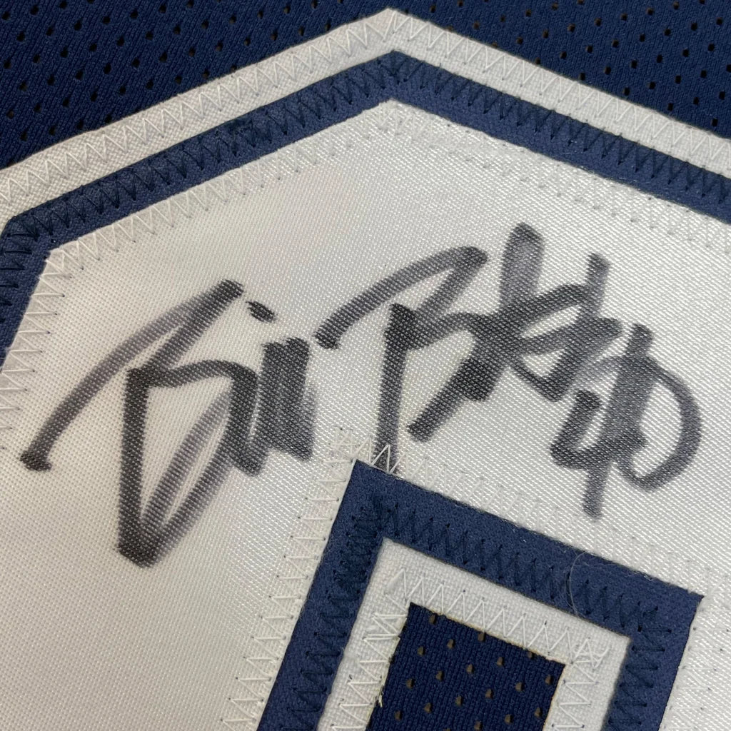 Framed autographed bill bates navy blue and white mesh football jersey with black stitched signature on the chest