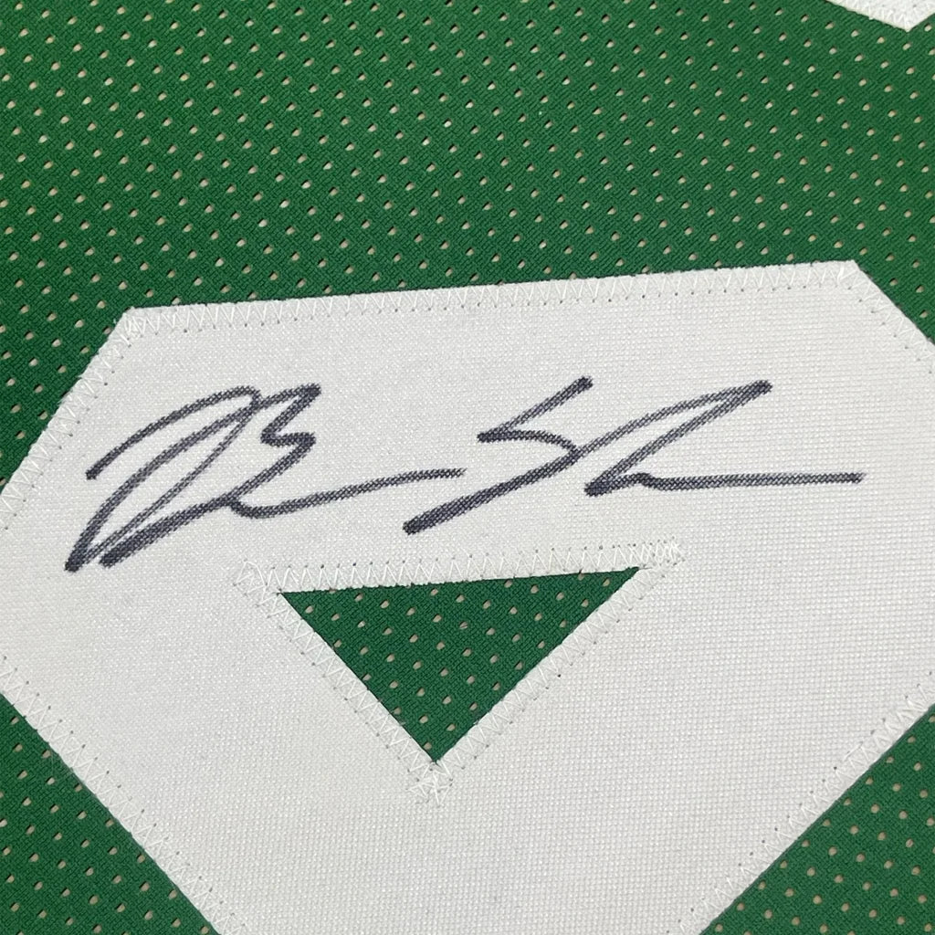 Green Celtics jersey with black autograph on white patch in Framed Brian Scalabrine display