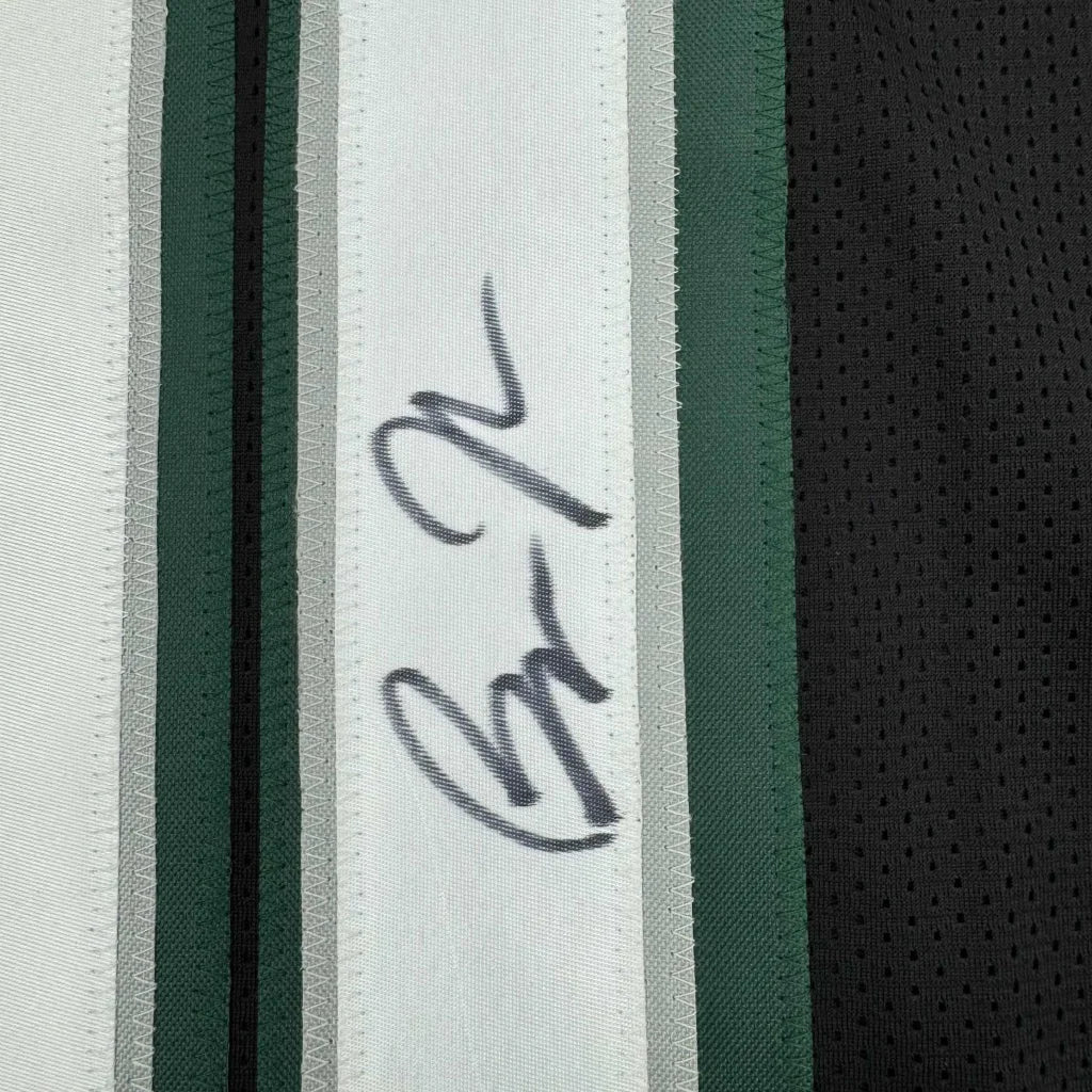 White green black striped athletic fabric with autograph on Bryce Huff framed jersey