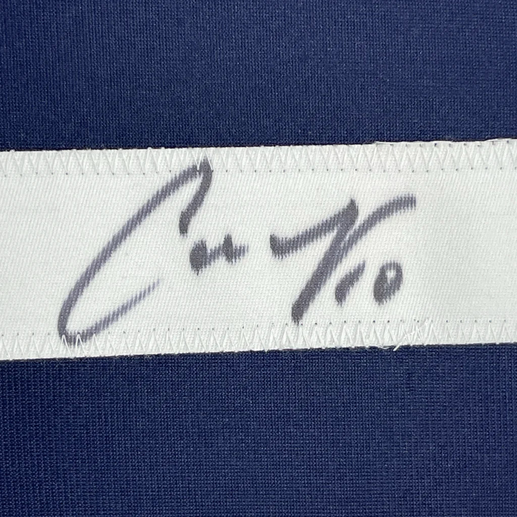 Framed autographed Carli Lloyd USA World Cup navy jersey with JSA COA