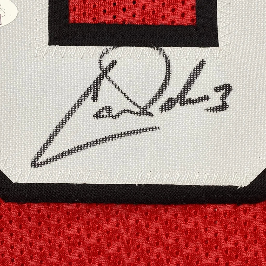 Autographed Red Cardinals Jersey with White Number Patch ready to hang on your wall
