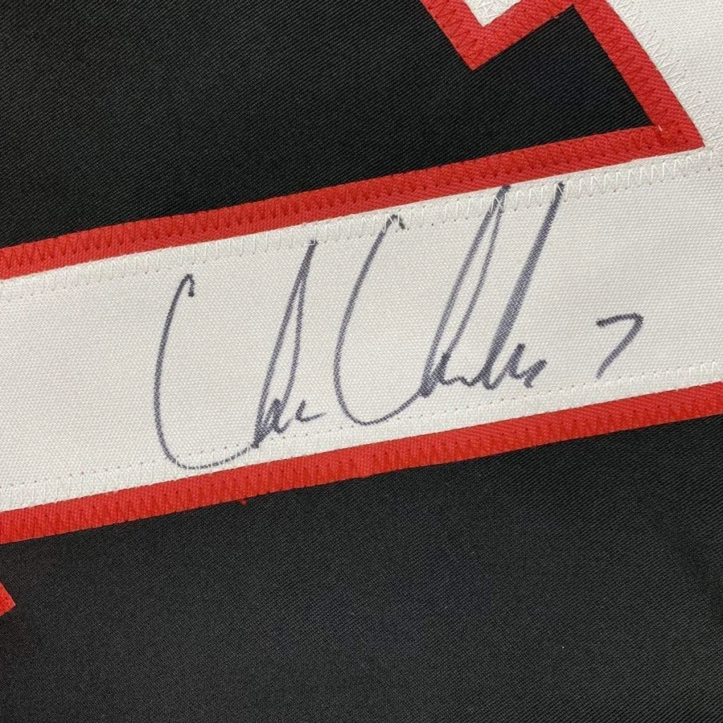 Framed autographed Chris Chelios Chicago Blackhawks hockey jersey with white C signature
